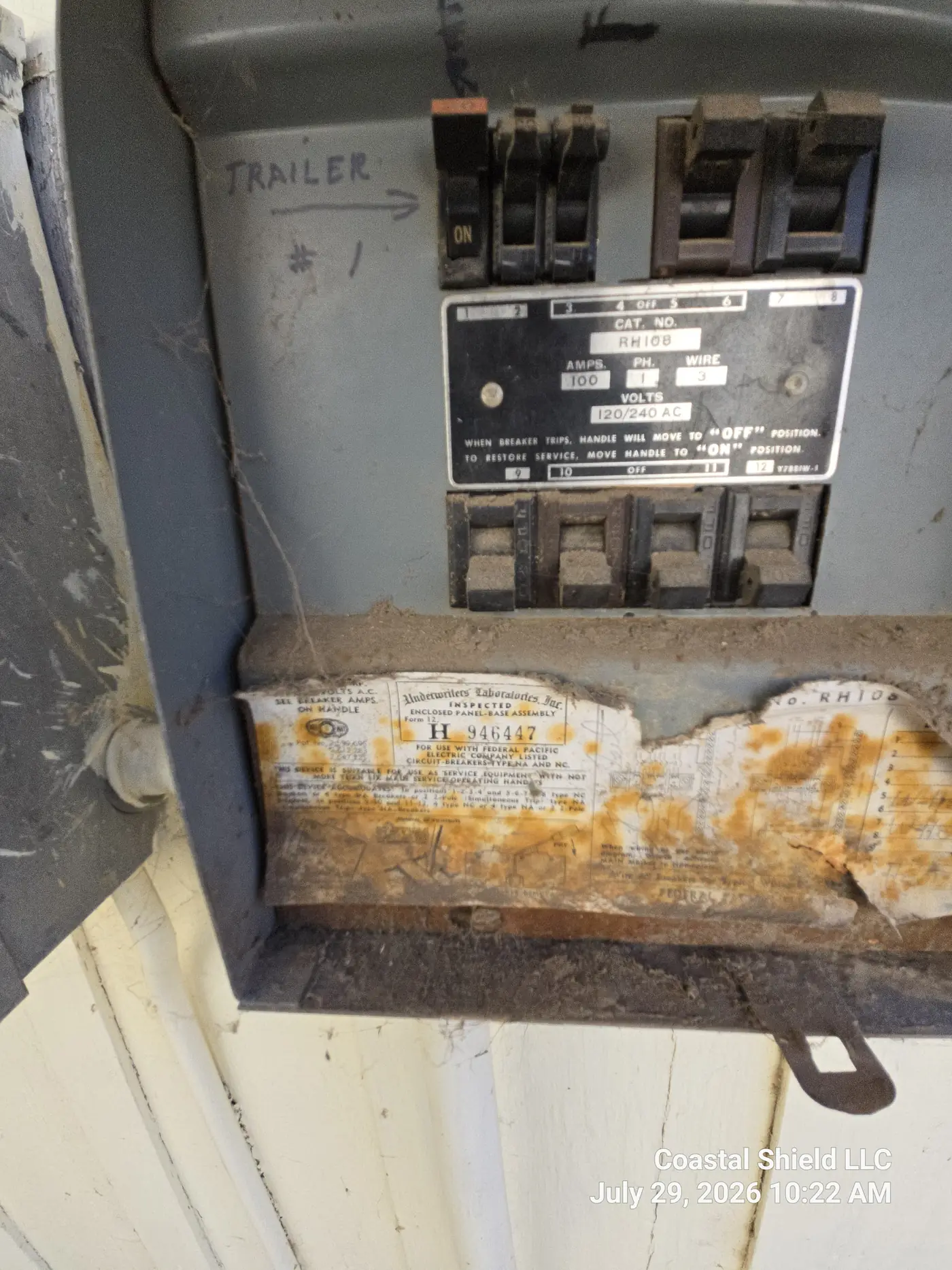 Federal Pacific Stab-Lok sub-panel with rust staining, its label still legible
